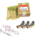 Genuine Honda clutch shoe set 22535-K1N-V00 with three clutch shoes and Honda packaging