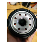 ISUZU Genuine Oil Filter 8973587200 – bottom view showing inlet holes