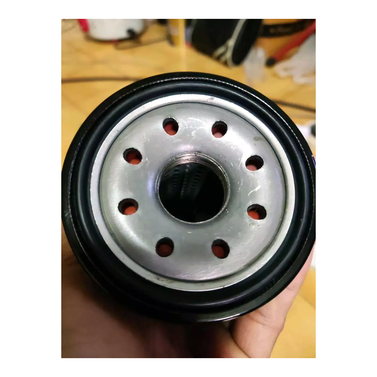 ISUZU Genuine Oil Filter 8973587200 – bottom view showing inlet holes