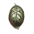 Brass leaf soap dish held in hand showing compact palm-sized scale