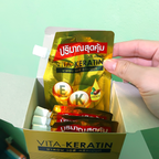 Vita-Keratin Salon Daily Treatment 50 ml pouch held in hand